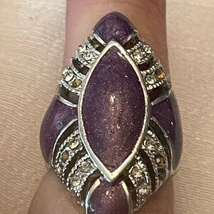 Silver tone swirl oval purple enamel offset round rhinestone smooth shank ring